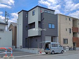 草加市金明町