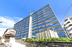 日明コータース