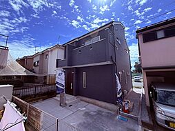 緑と共存する開放的な風景の中の限定1邸