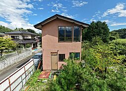 園風景の先に、南アルプスを望む。武川町山高の小さな一邸。