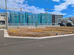 草加市金明町